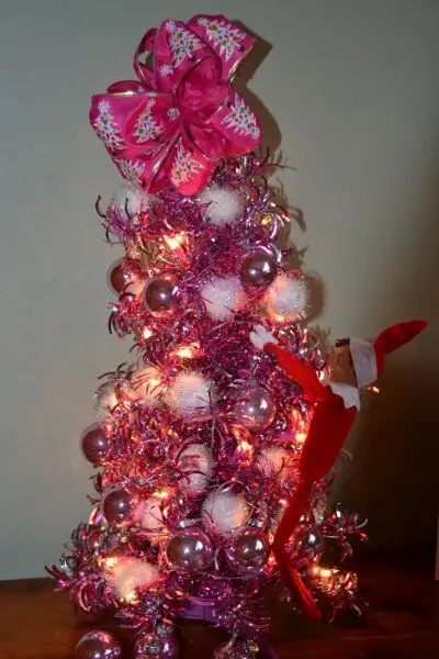 Elf on a Shelf Decorates the Christmas Tree