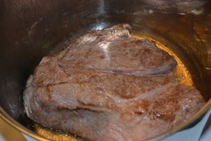 brown the beef pot roast