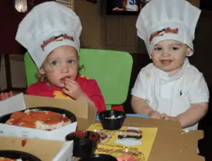 toddlers at pizza party