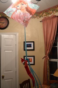 elf on the shelf flying a kite