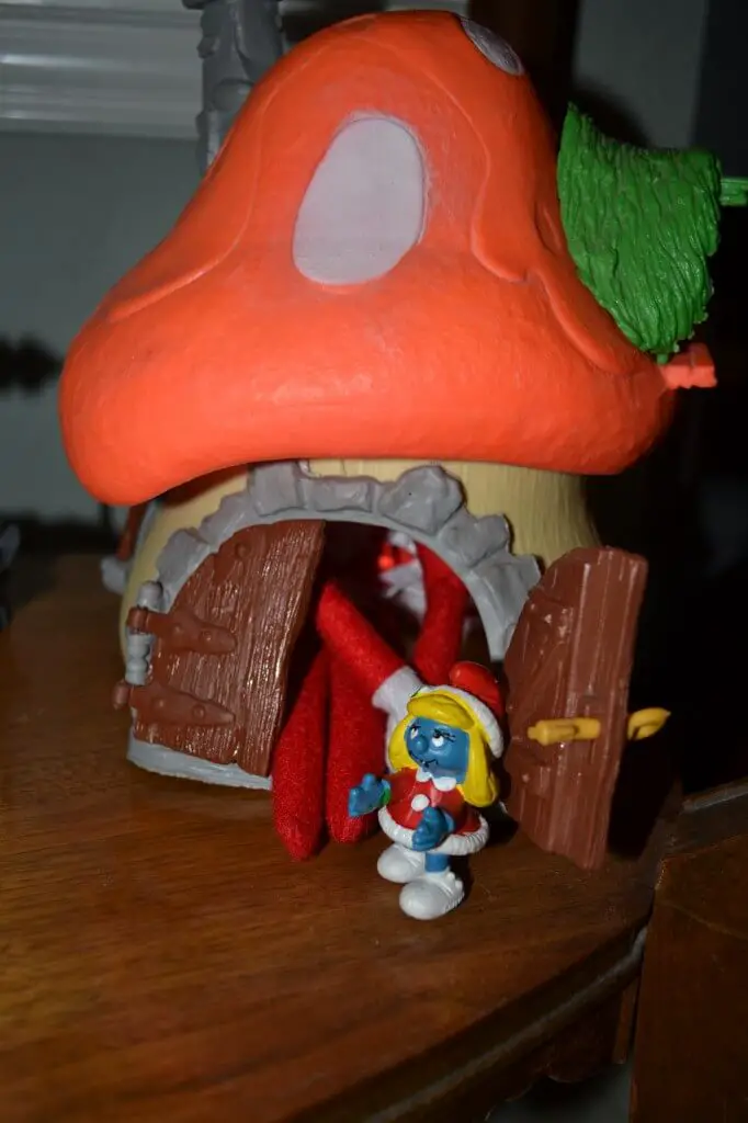 elf hiding in smurf village