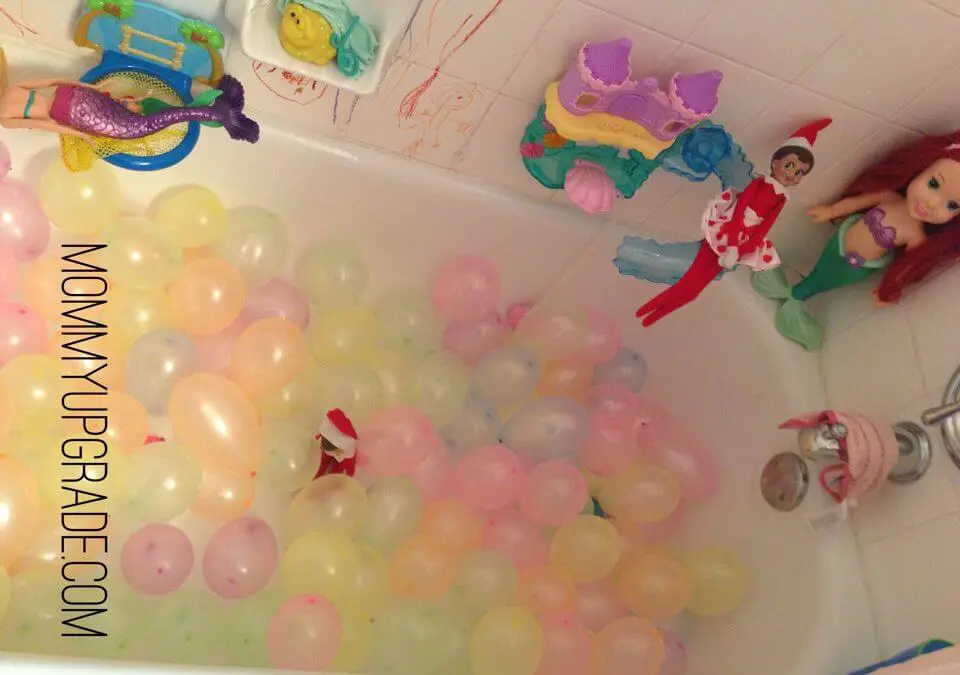 elf on a shelf balloon ball pit in tub