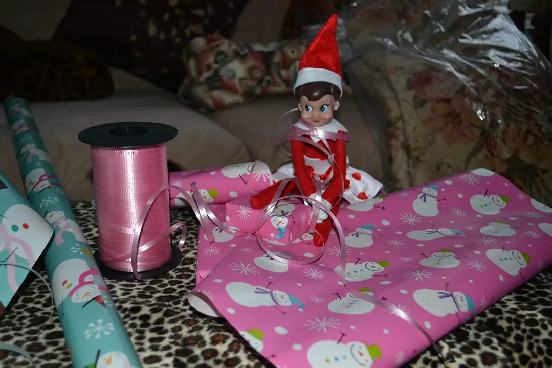 elf on the shelf wrapping presents