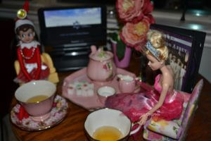 tea drinking elf with barbie