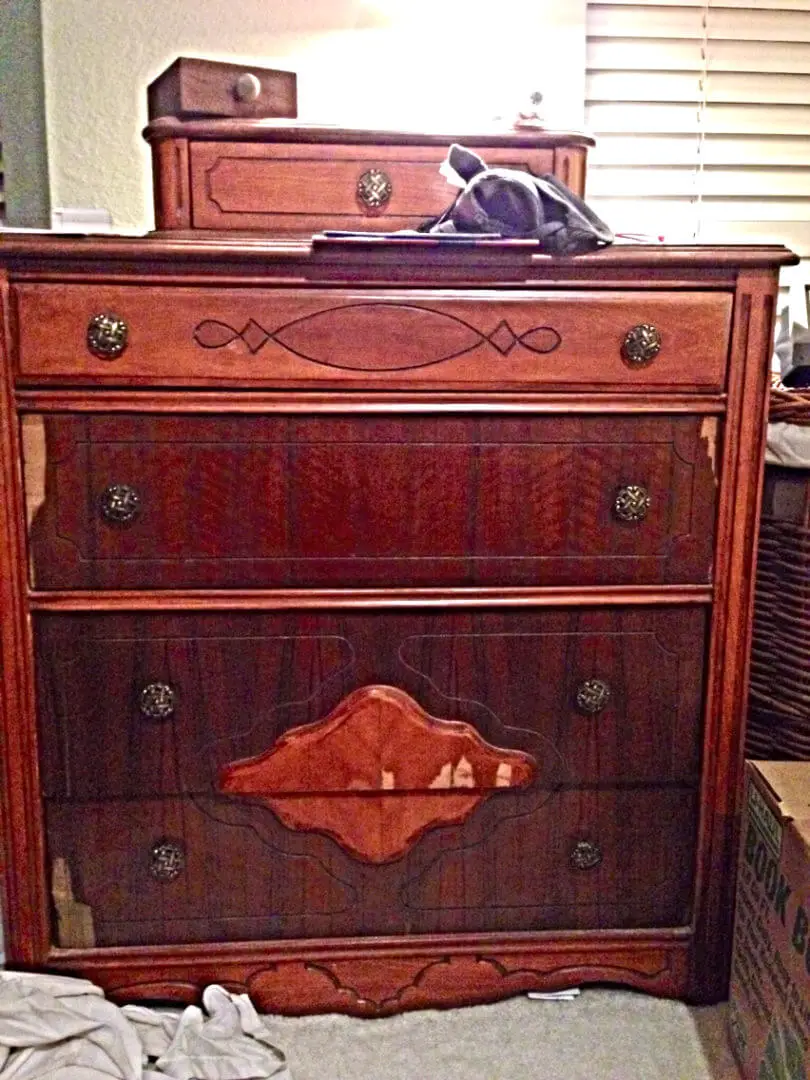 before photo of antique dresser