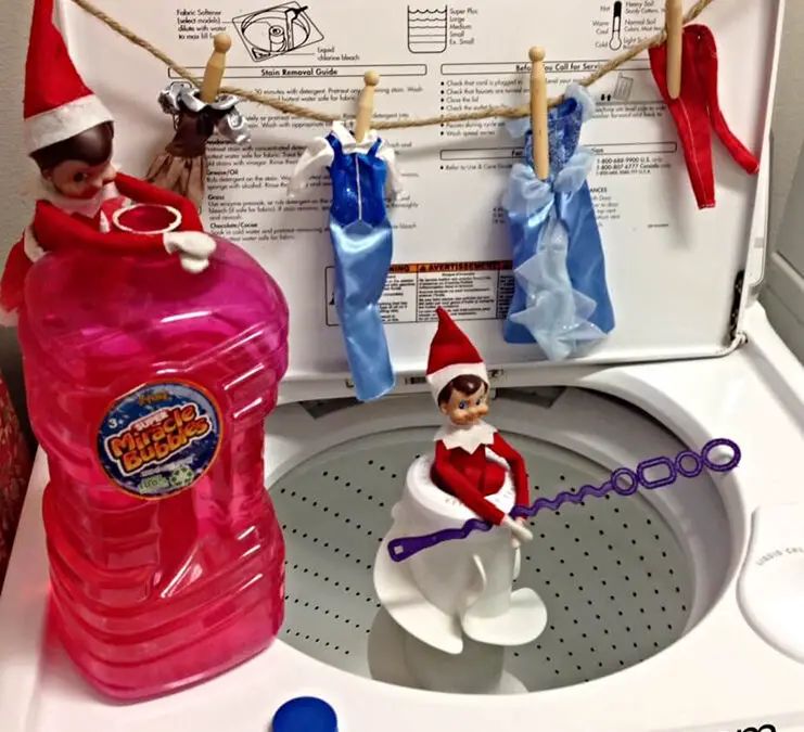 elf doing cinderella's laundry