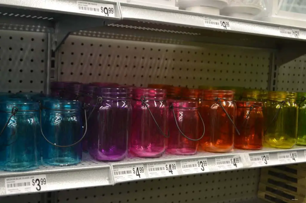 colored bottles on shelf colored bottles on shelf