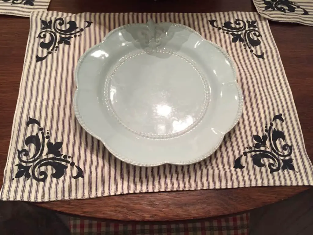 plain placesetting on french country placemats plain placesetting on french country placemats