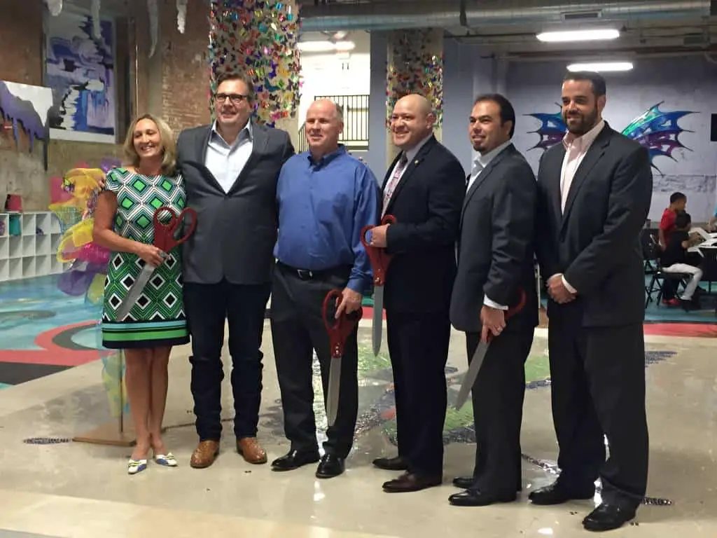 ribbon cutting with execs of SPARK! Dallas
