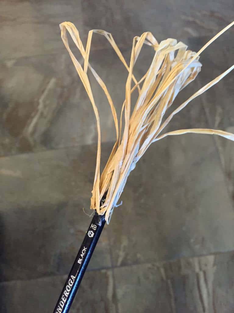 applying straw to a pencil applying straw to a pencil