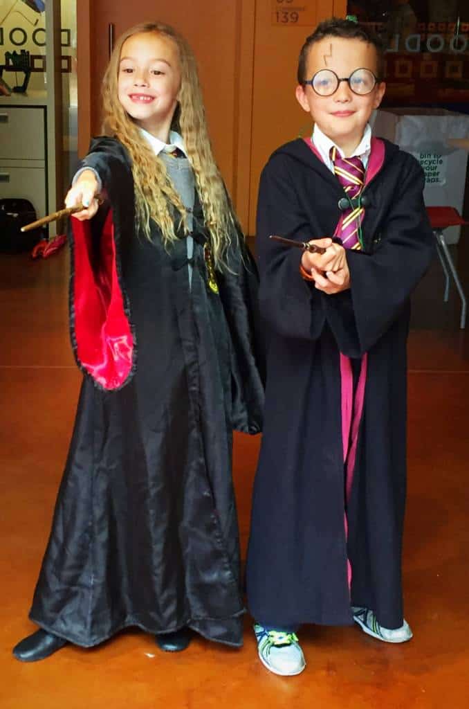 kids at a harry potter party costumes