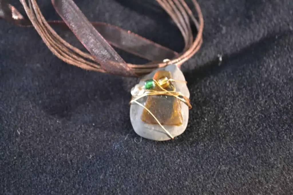 closeup of sea glass necklace closeup of sea glass necklace