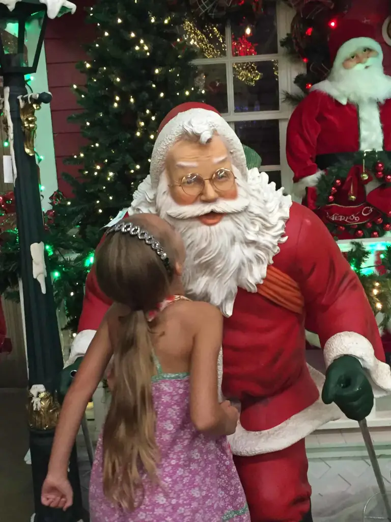 kissing santa at the decorators warehouse kissing santa at the decorators warehouse