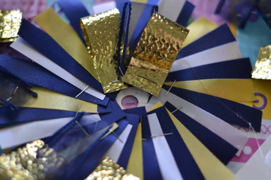 adding looped ribbons to homecoming mum adding looped ribbons to homecoming mum