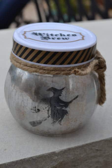 mercury glass looking witch luminary