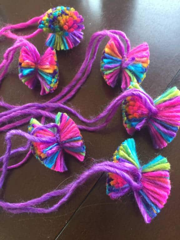 making rainbow pom moms