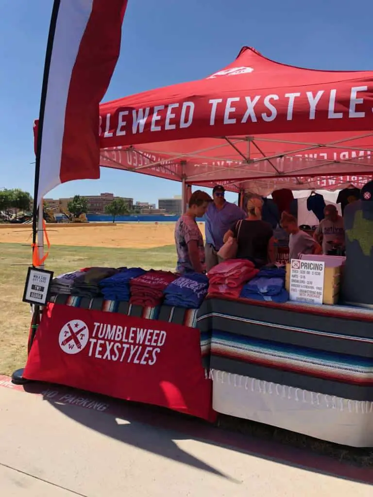 t-shirt vendor at frisco farmers market