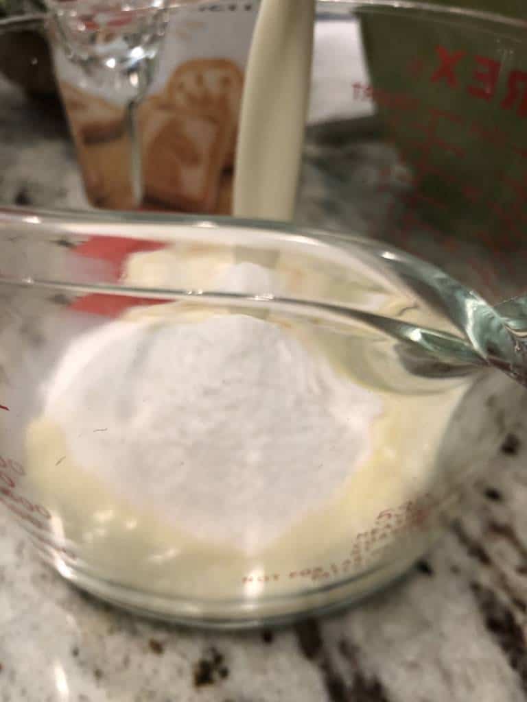 Mixing the ingredients for banana pudding