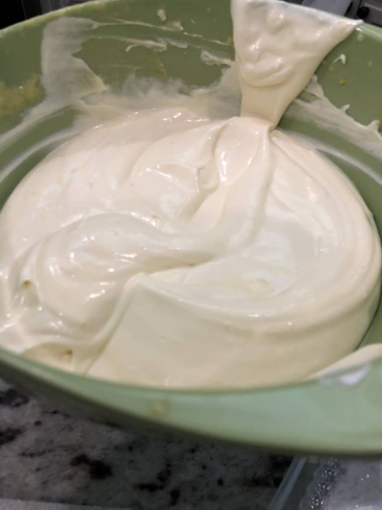 mixing ingredients for banana pudding pudding mixture
