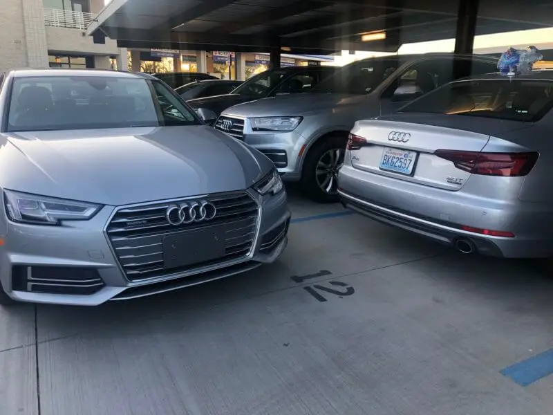 silver cars ready for rental by Audi 