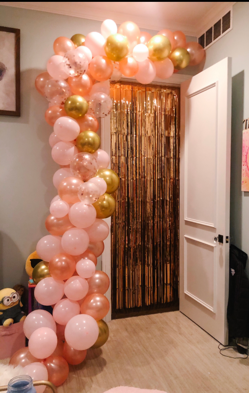 Balloon arch over door