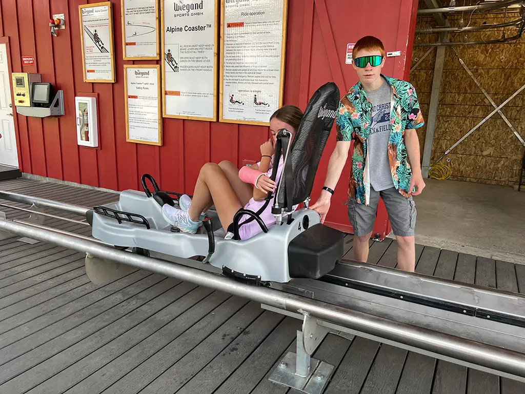 strapping in ride Mustang Mountain Coaster - strapping in!