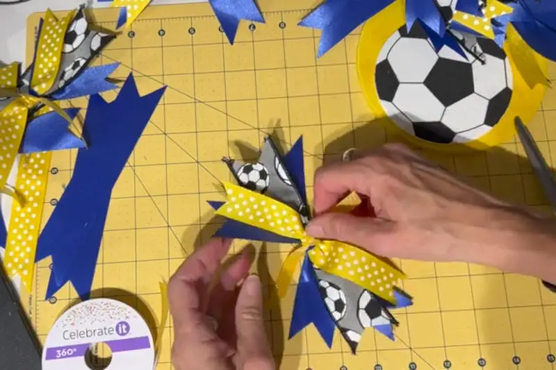 arrange-ribbons arranging ribbons for the soccer door hangers